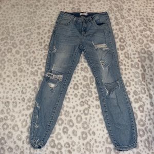Very ripped blue jeans size 3